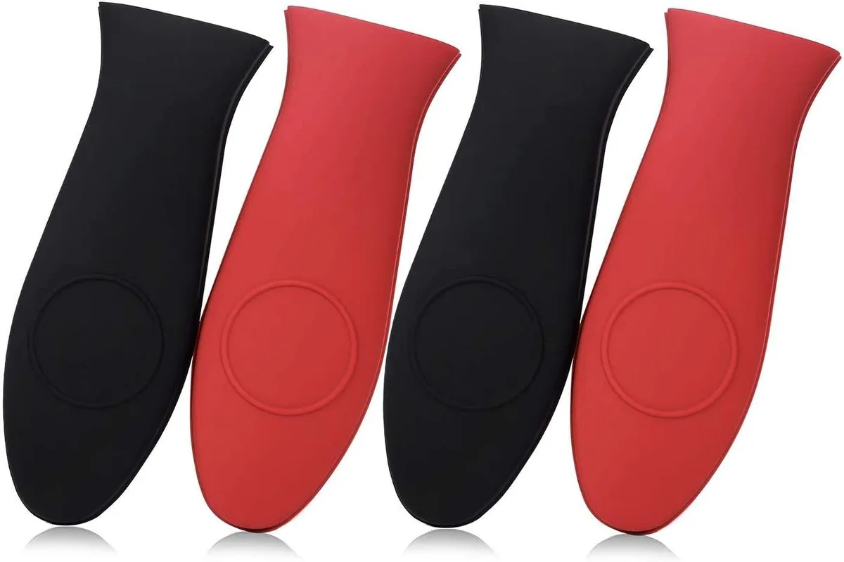 Four black and red silicone handle sleeves, flexible and textured