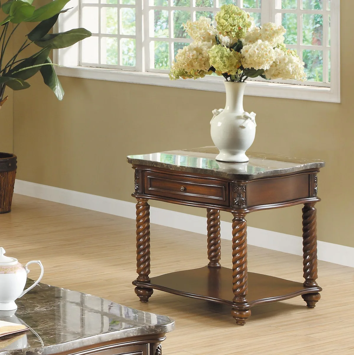 Mahogany end table with white marble top, spiral turned legs, drawer and lower shelf