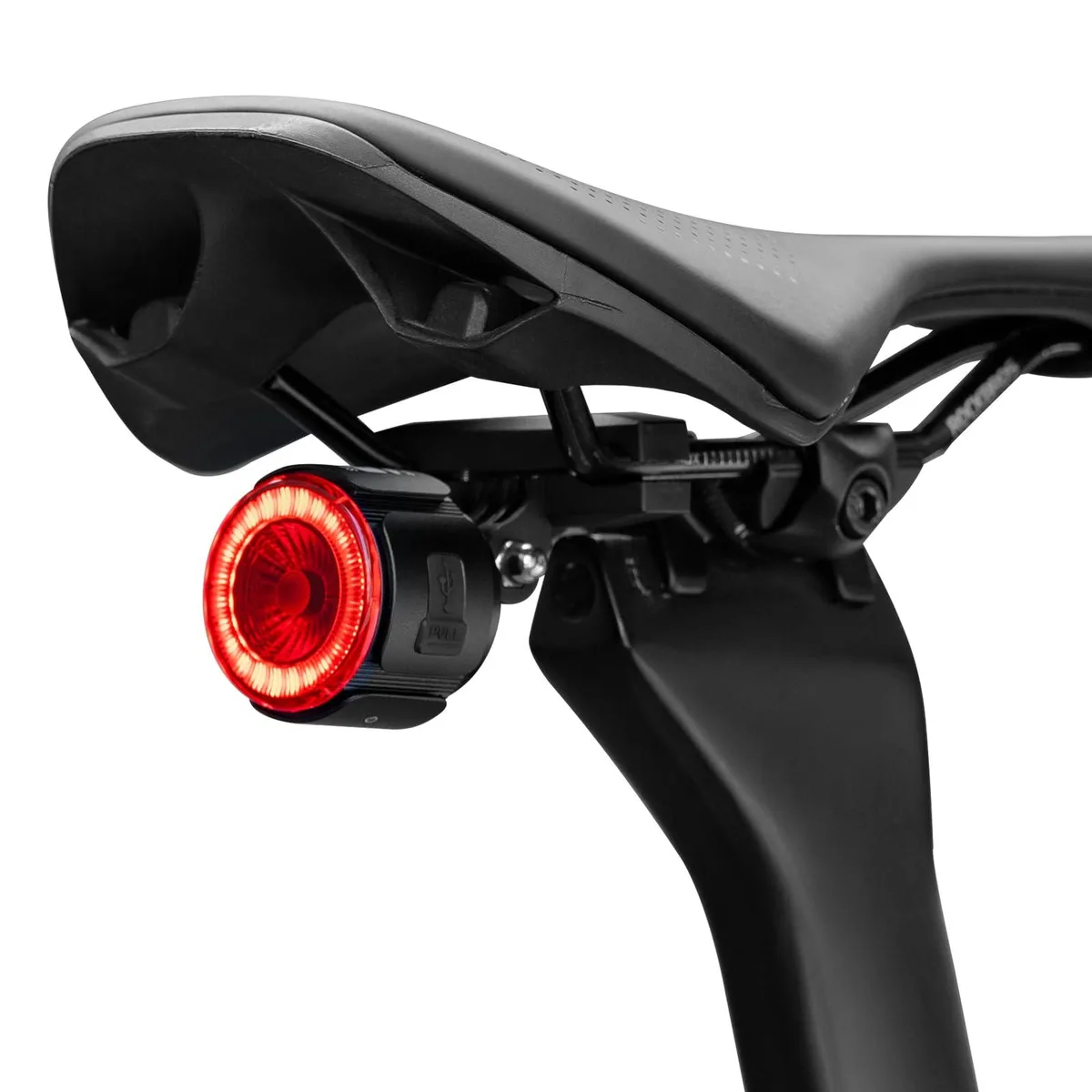 Compact silver aluminium bike taillight with dual mounts and adjustable angle