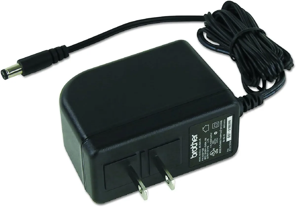 Black rectangular 12 V power adapter with slim profile