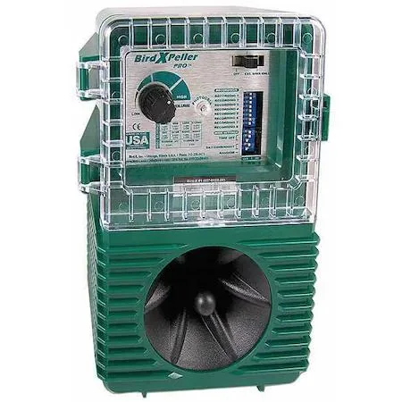 Transparent plastic electronic bird repeller, rectangular wall-mount housing, 220V power cord visible