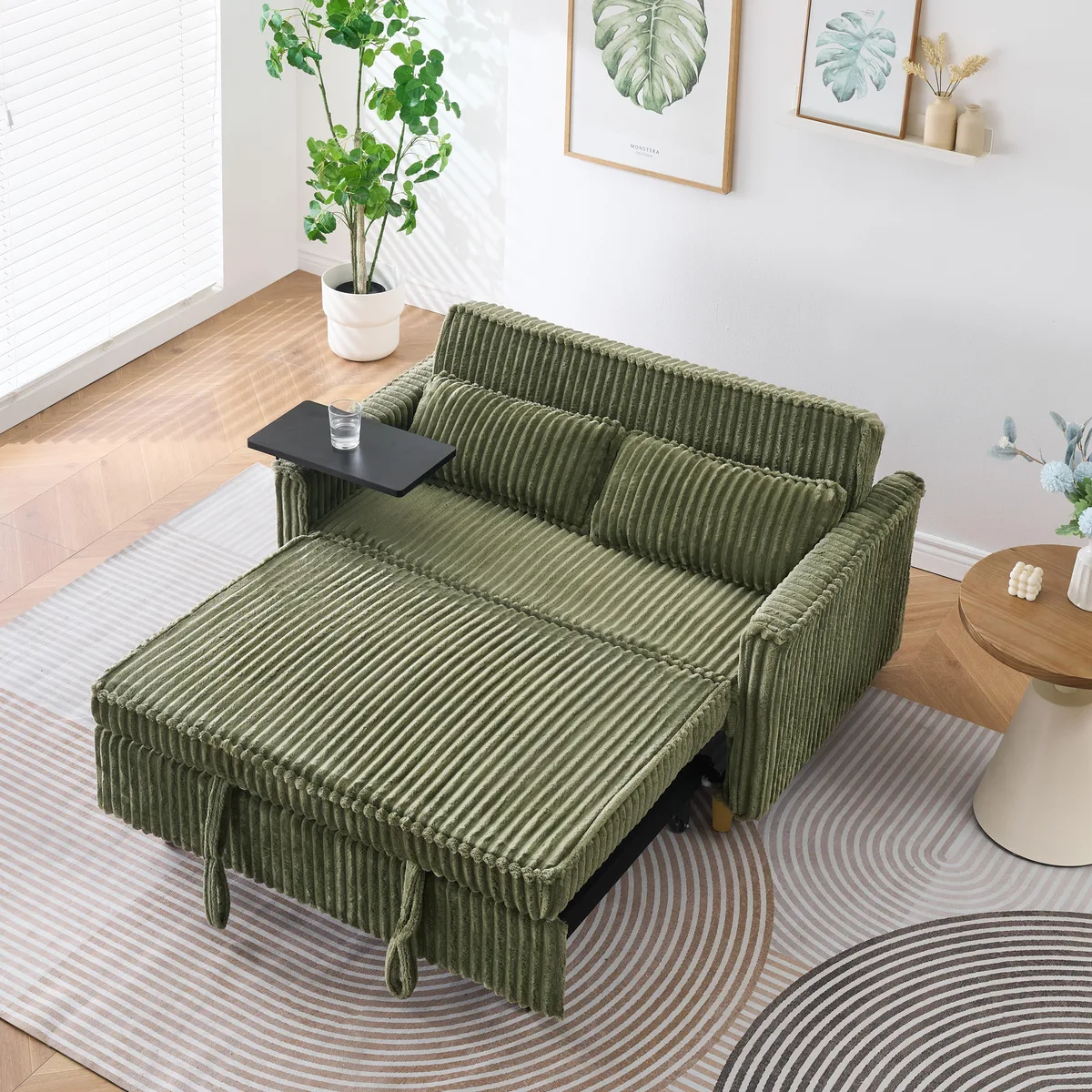 Green corduroy sofa bed with movable tabletop, USB port, rollers and three recline positions