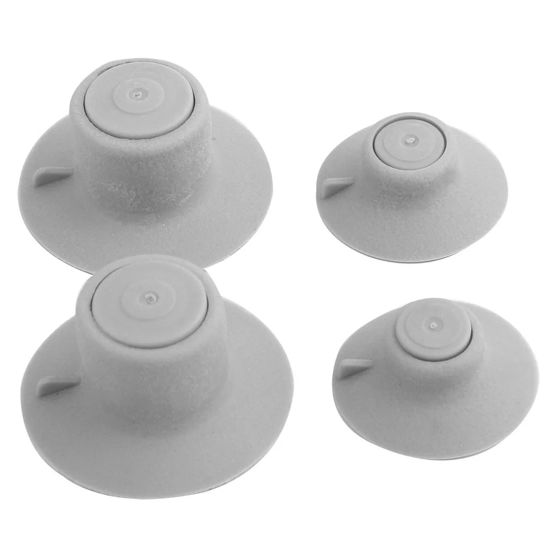 Four gray rubber cooling feet, two sizes with suction cups