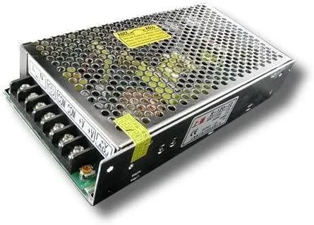 Rectangular metal power supply unit with screw terminals and ventilation slots