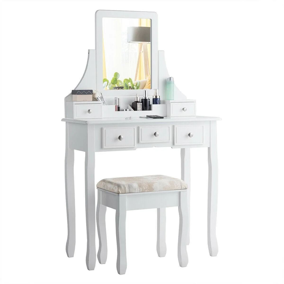 White vanity desk with five drawers, round mirror, padded stool