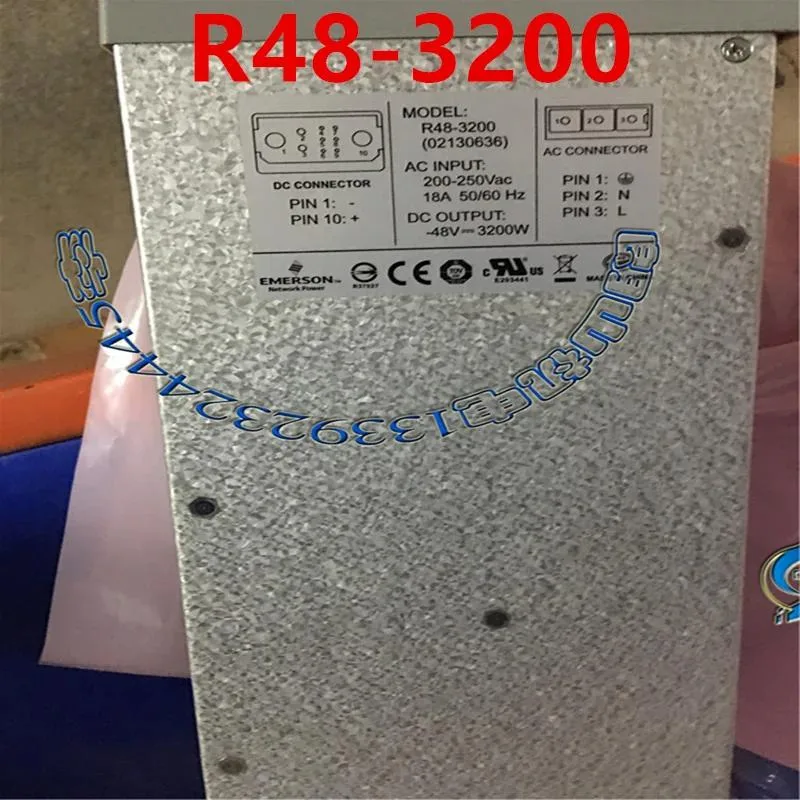 Silver rectangular ATX power supply unit with fan grille