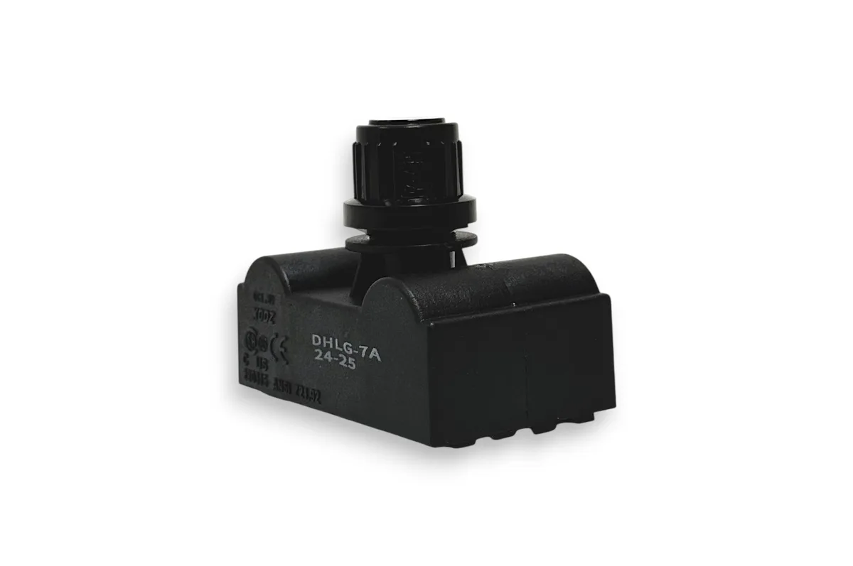 Small rectangular electronic igniter module with plastic housing and metal terminals
