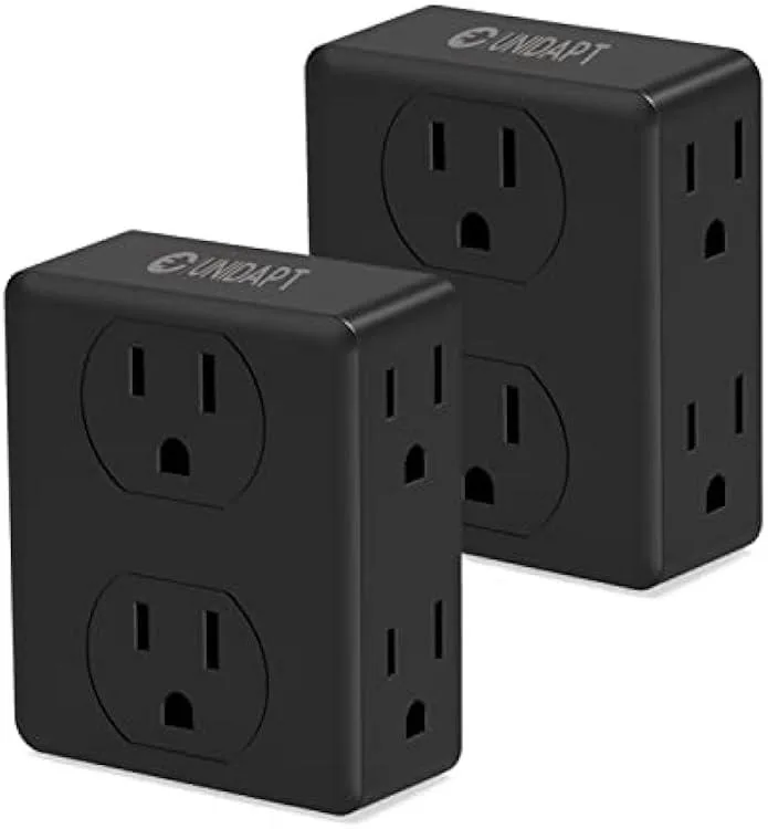 Two black plastic wall outlet expanders each with six grounded sockets arranged on front and sides