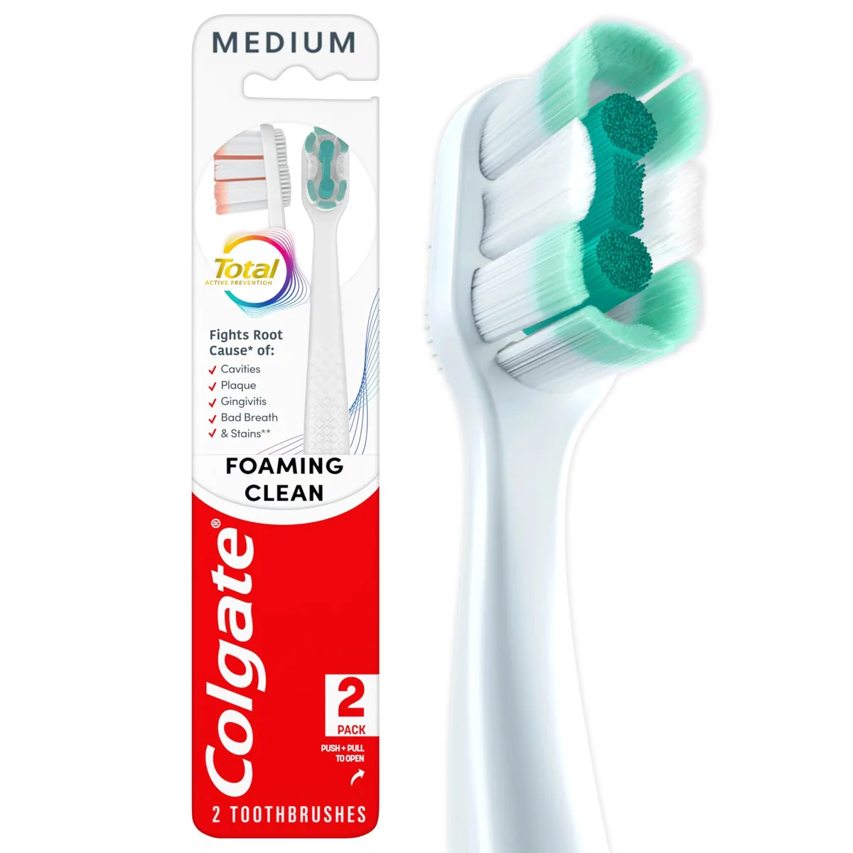Two white manual toothbrushes with medium bristles in a pack