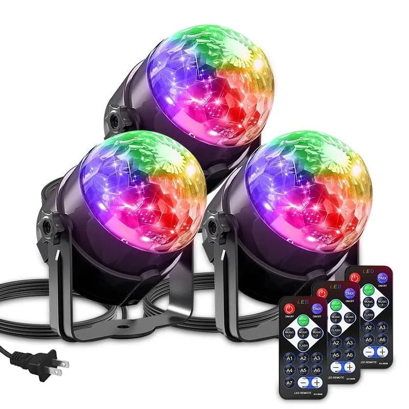 Three compact white cube LED lights on a table