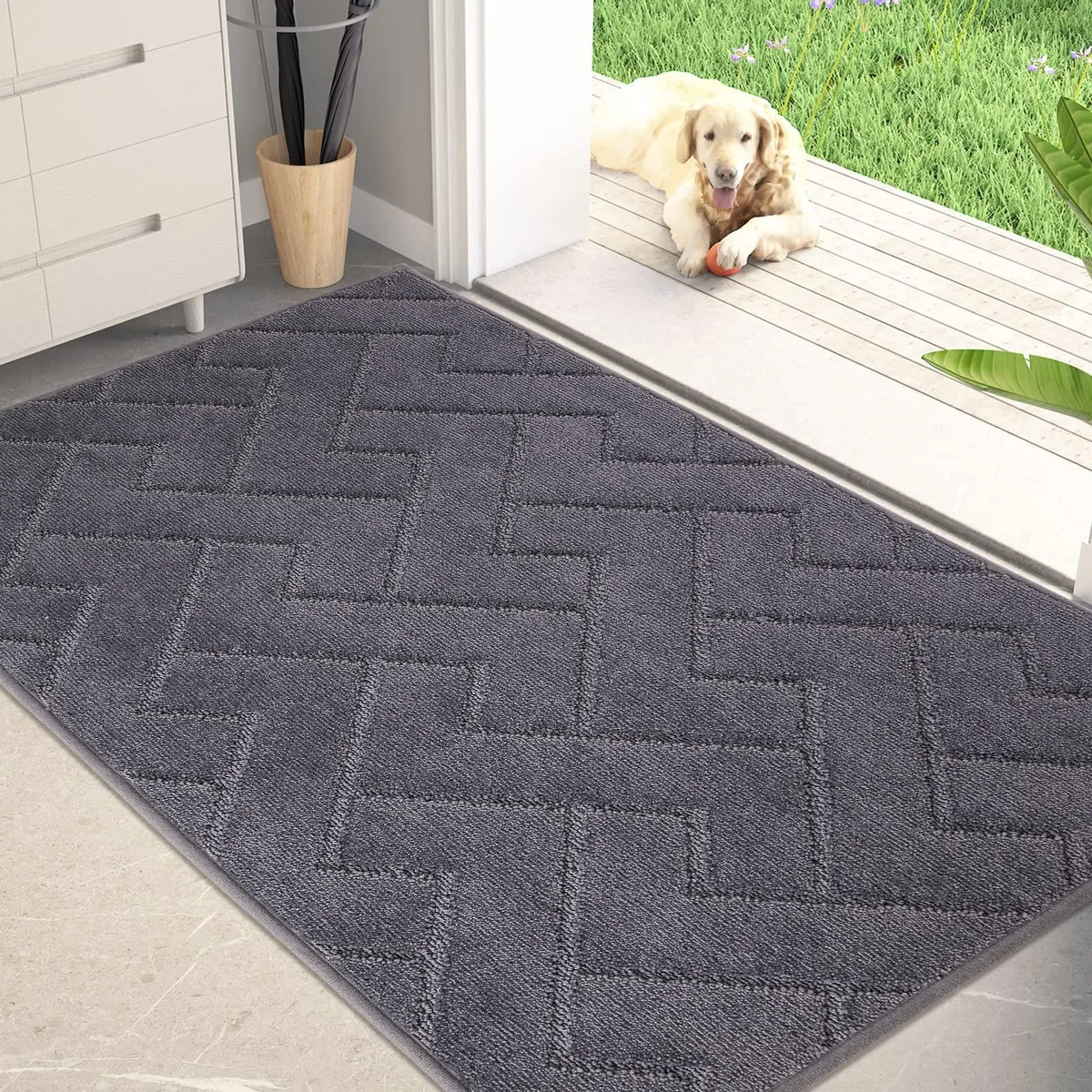 Grey rectangular door mat with low-pile geometric pattern and non-slip backing