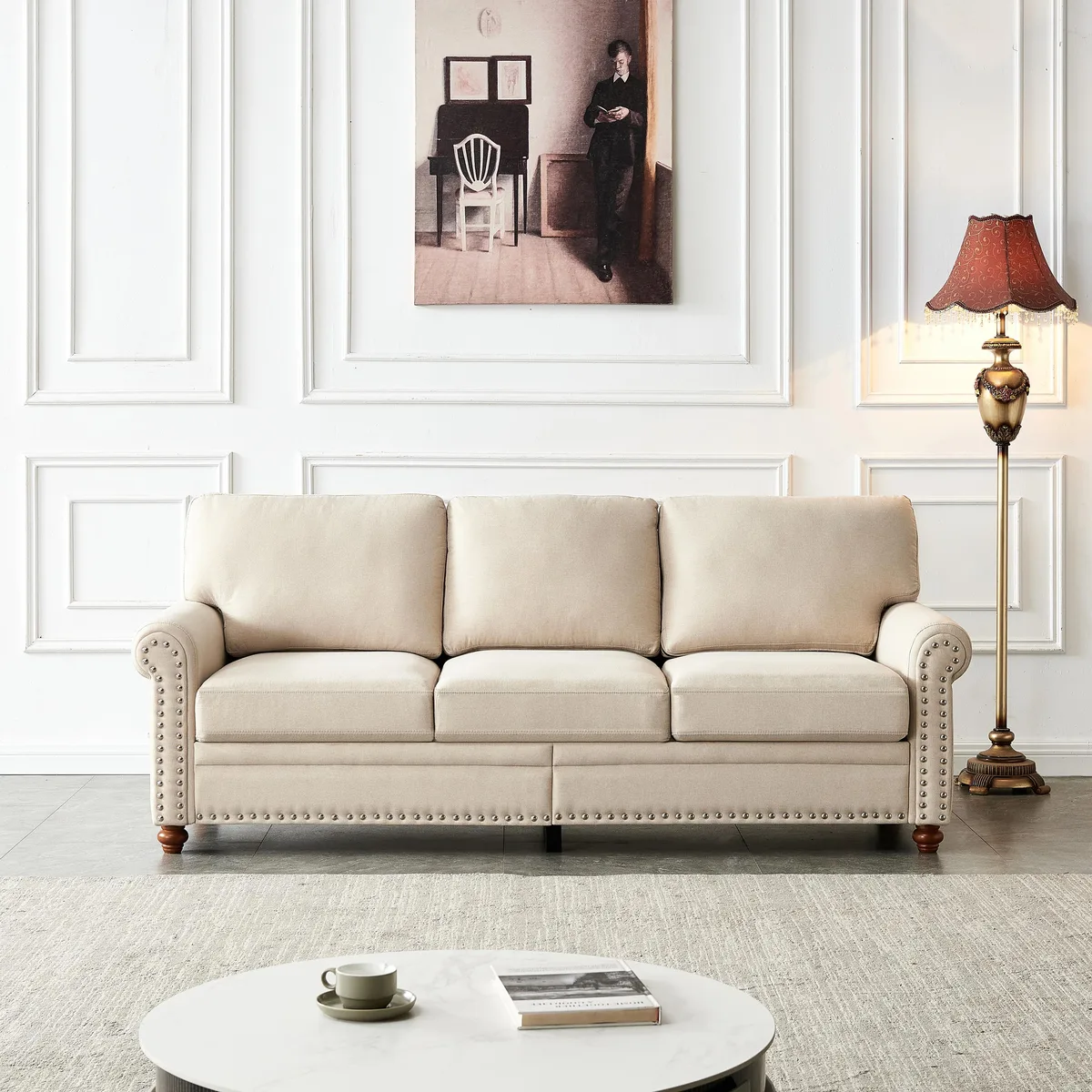 Beige linen fabric sofa with silver nail trim and six solid wood legs