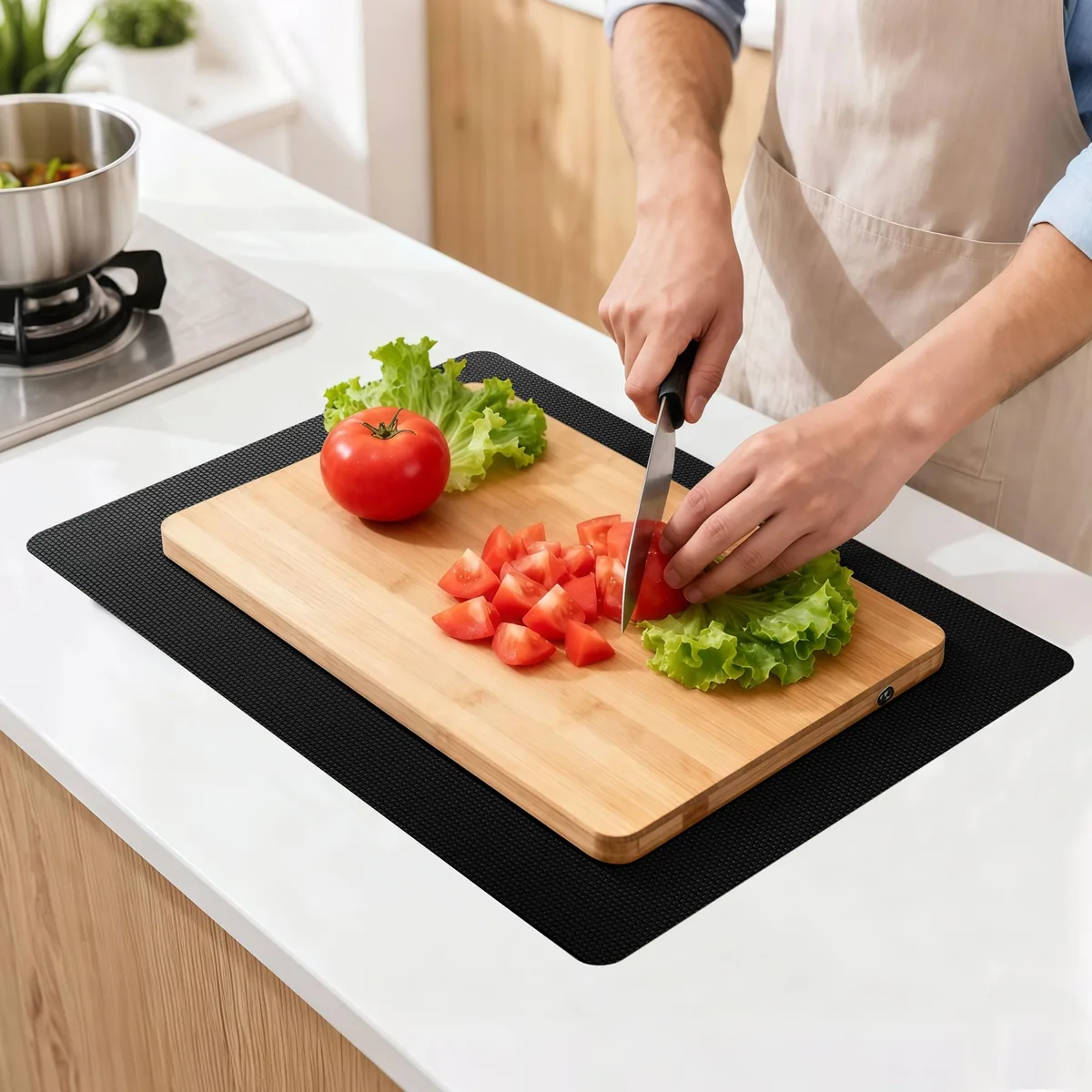 Thin rectangular black mat with textured surface, 15 by 10 inches