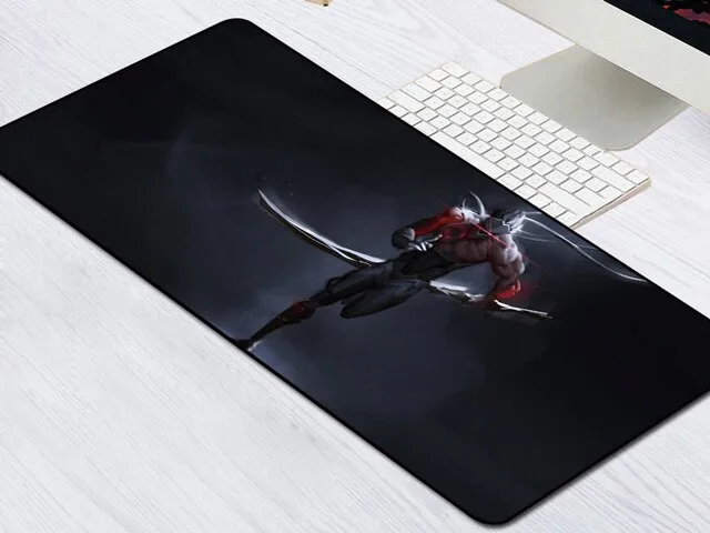 Large rectangular mouse pad with patterned cloth surface and rubber base, stitched edges, 800 by 300 millimetres