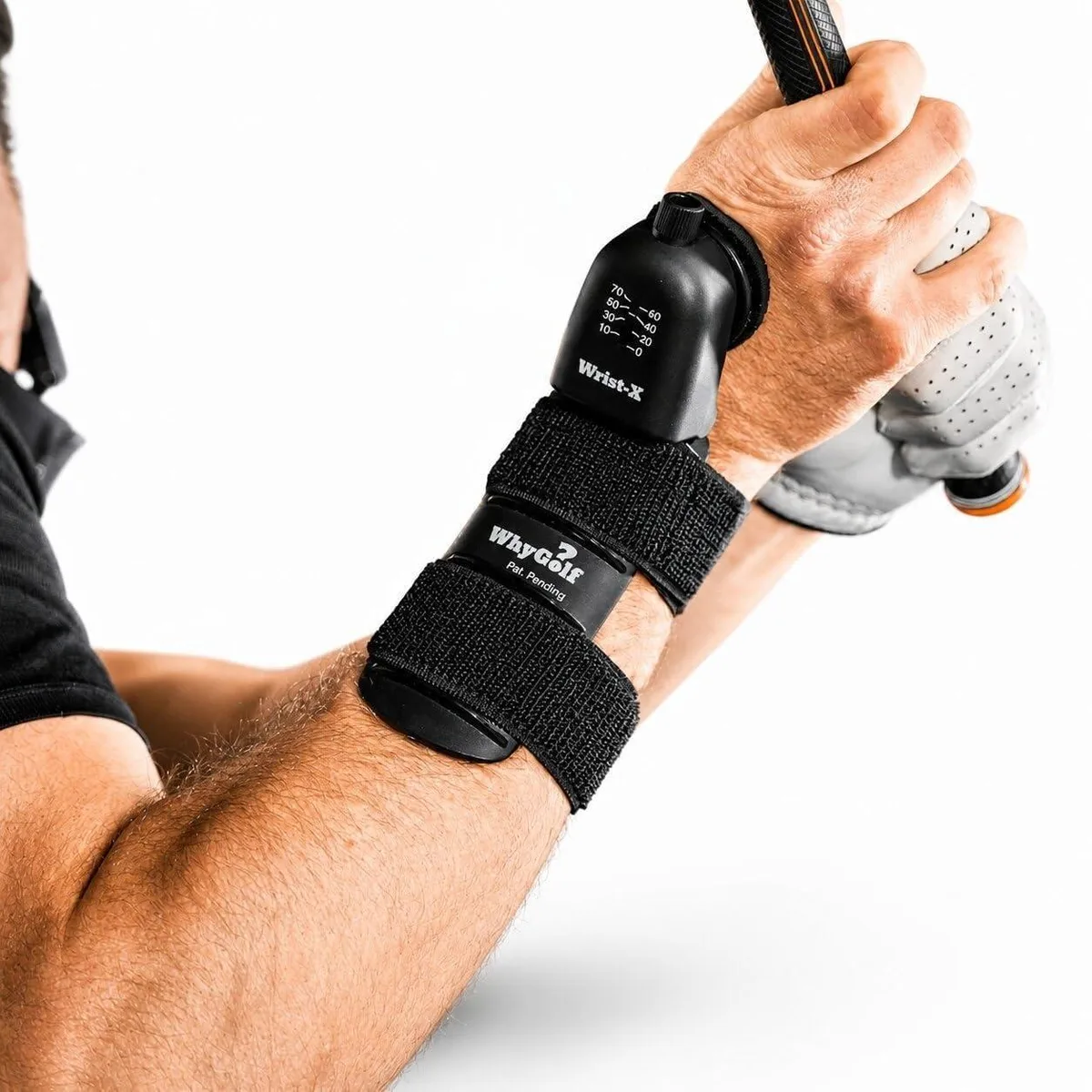 Black adjustable wrist trainer with audible click mechanism for golf swing training