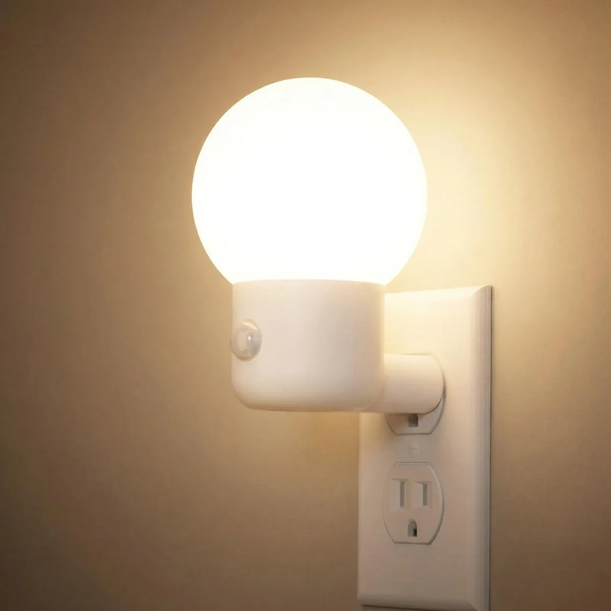 Compact white plastic plug-in LED night light with 360° halo glow