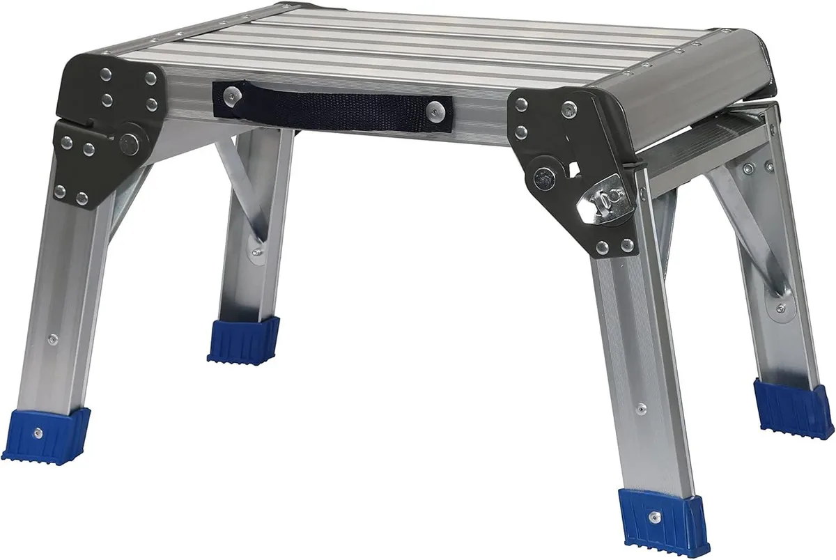 Silver aluminium step stool with platform, rubber feet and carry handle, folded flat