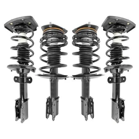 Four silver strut assemblies with coil springs and mounts