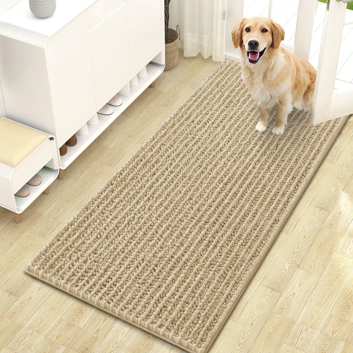 Rectangular beige chenille door mat with rubber backing, 47 by 24 centimetres