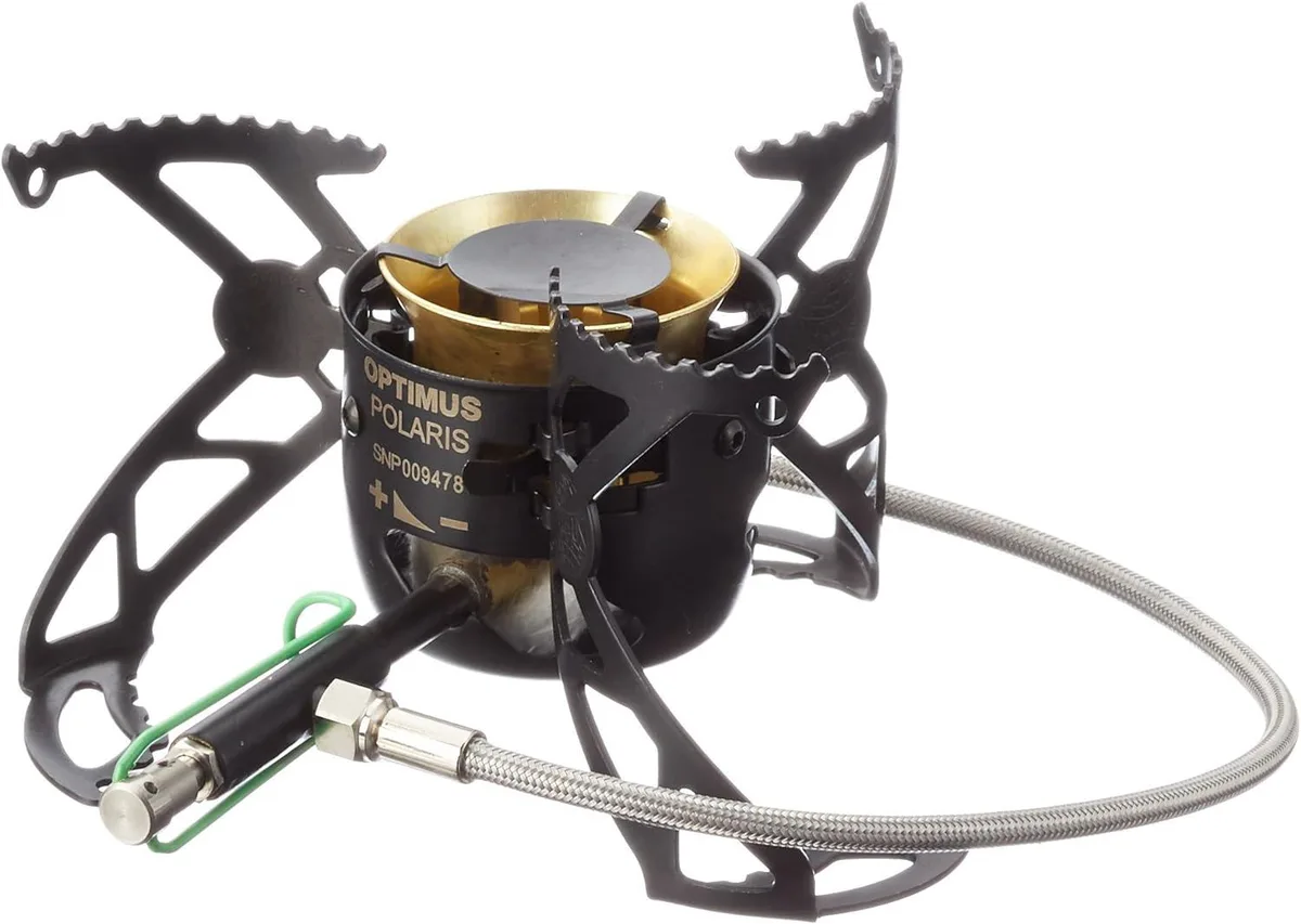 Compact silver metal stove with folding pot supports and integrated fuel pump