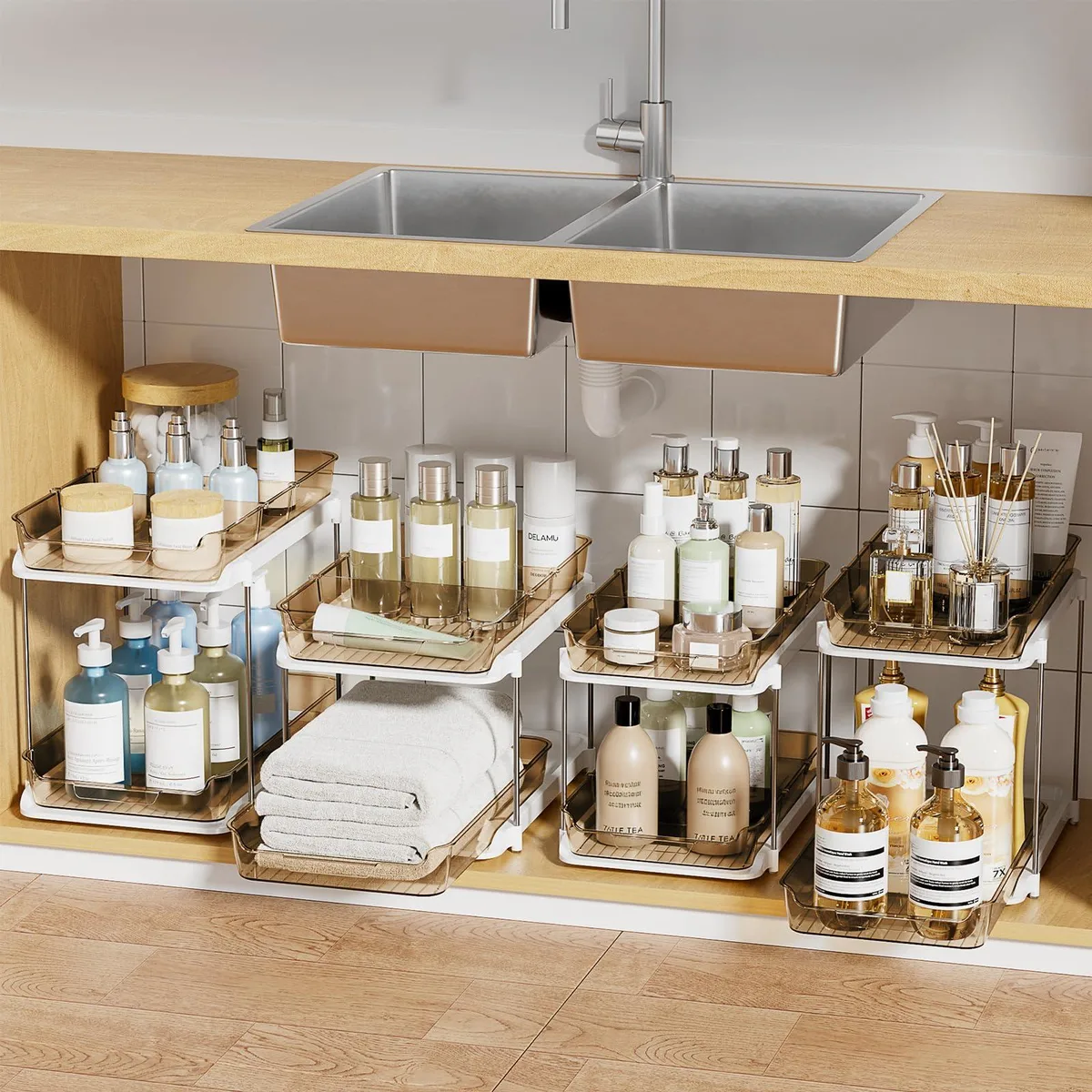 Four amber two-tier slide-out bath organizers with clear acrylic drawers, black metal frames and anti-slip mats