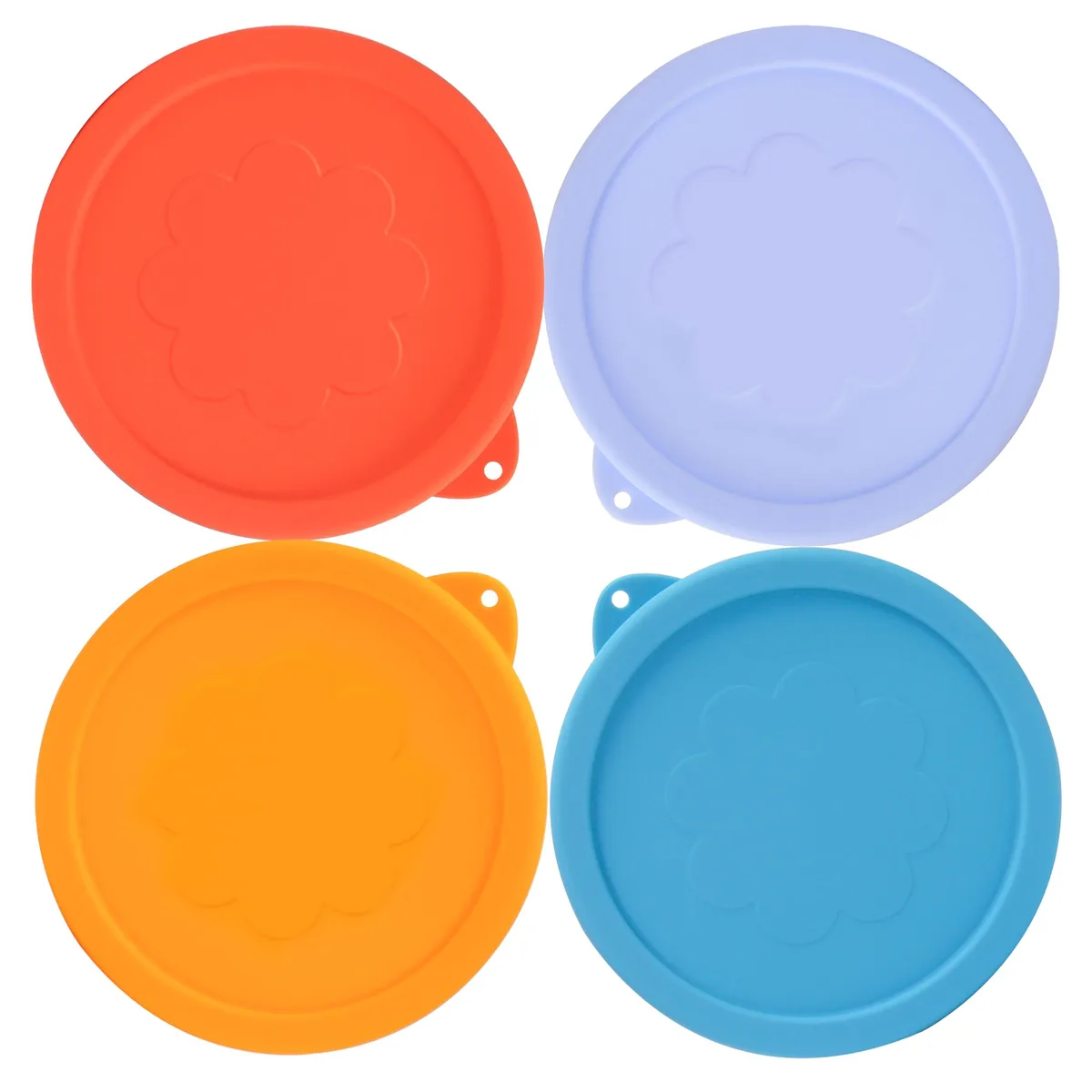 Four round silicone lids in assorted colours, flat flexible discs with smooth matte finish