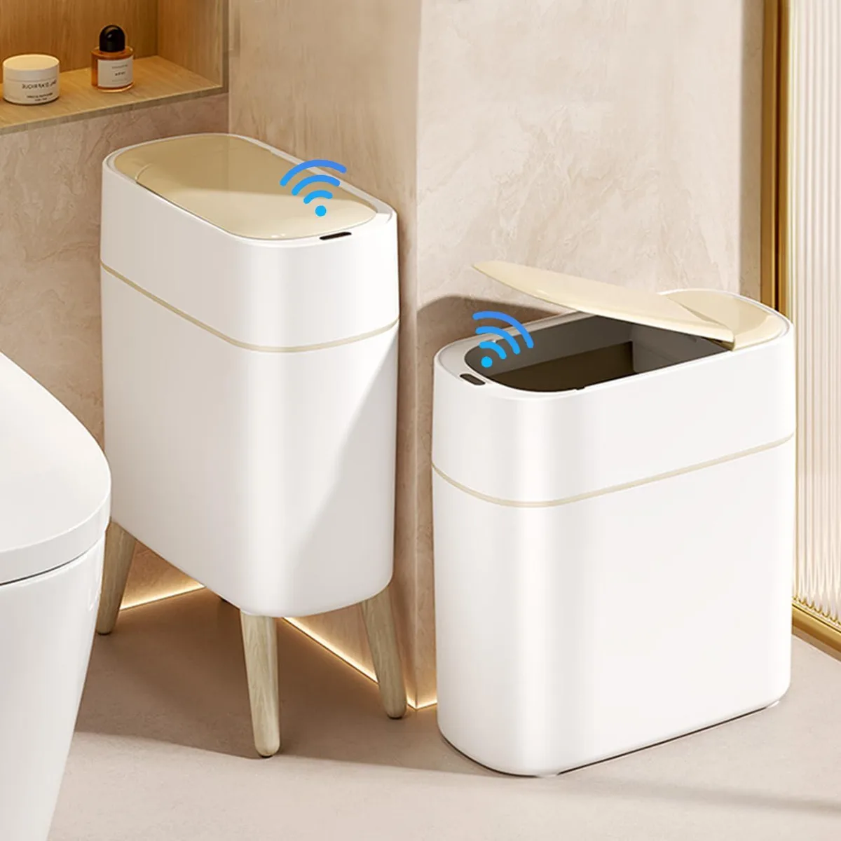 Three slim white touchless trash cans with raised detachable legs and motion sensor lids