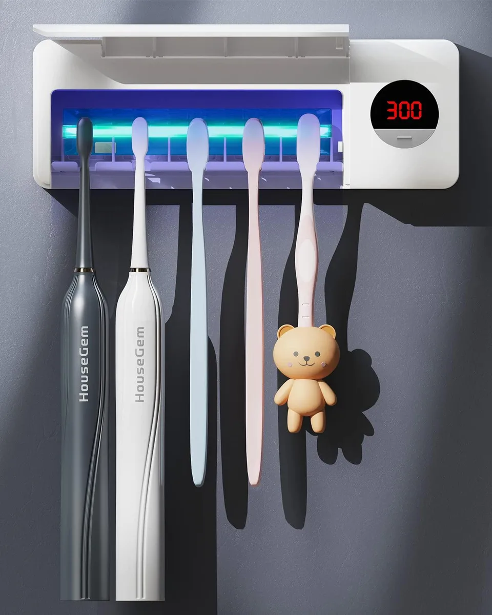 White wall-mounted toothbrush holder with LCD display and adhesive backing