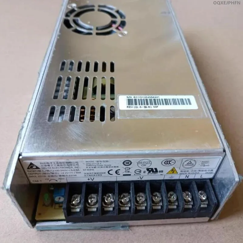 Rectangular ATX power supply unit in matte black metal casing with ventilation grille and fan visible
