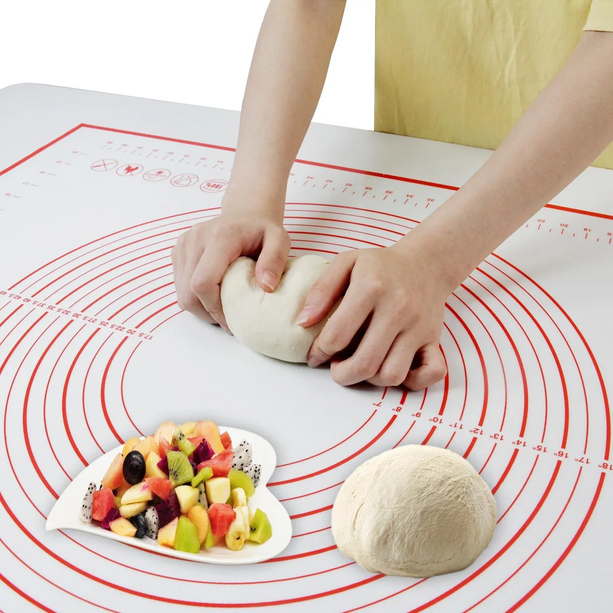 Red square silicone mat with printed measurement guides, 32 by 24 inches