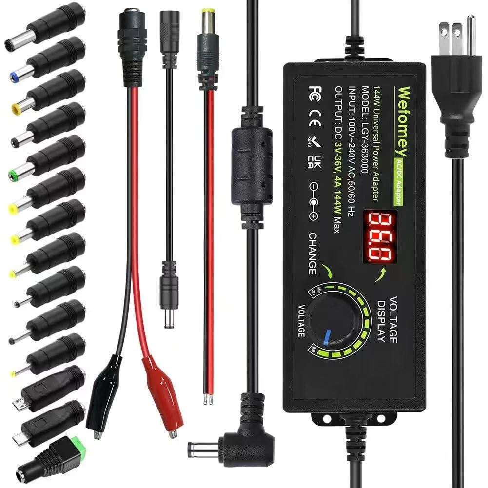 Black rectangular AC/DC adapter with LCD display and fourteen interchangeable DC tips