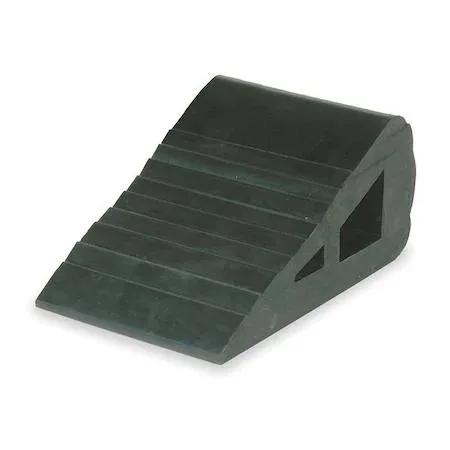 Black rubber wheel chock with grooved tread and hollow centre