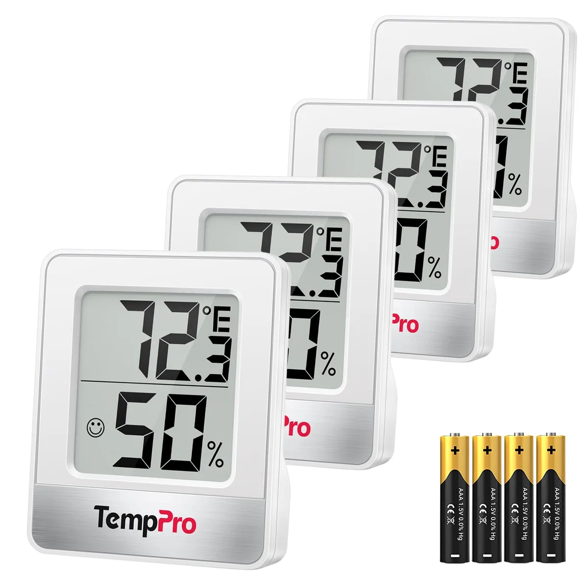 Four small black rectangular hygrometers with LCD screens showing temperature and humidity