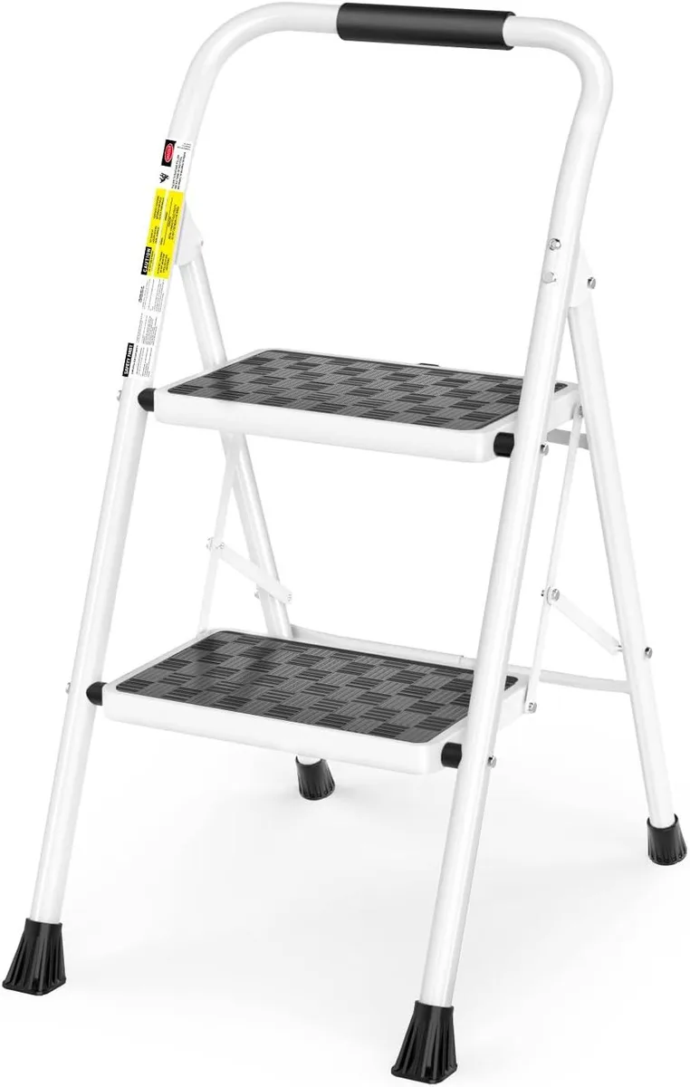 White two-step folding ladder with cushioned handle and anti-slip step mats