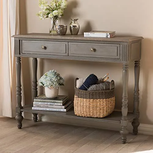 Warm brown console table with two drawers and lower shelf, ornate ball-turned legs, dark bronze pulls