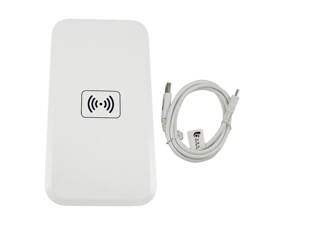 Flat rectangular Qi wireless charging pad with ventilation holes and anti-skid feet