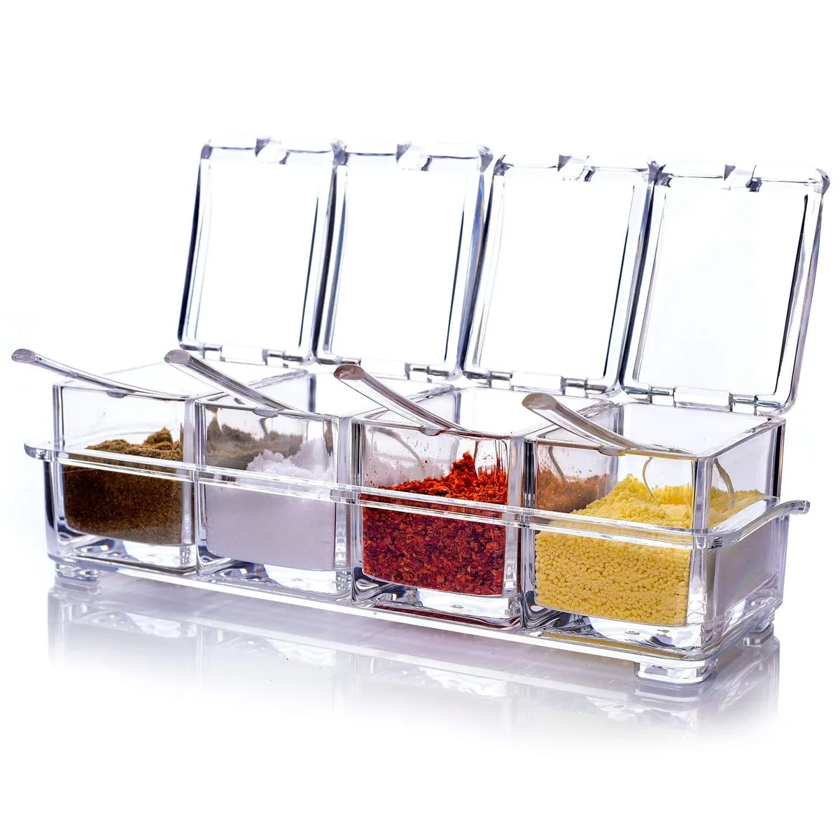 Four clear acrylic seasoning boxes with lids and spoons on a tray
