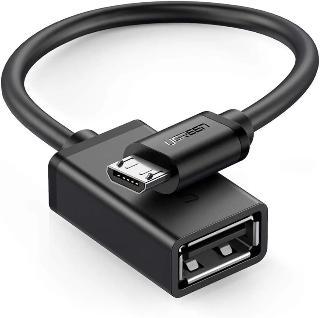 Short black Micro USB OTG cable with male and female connectors