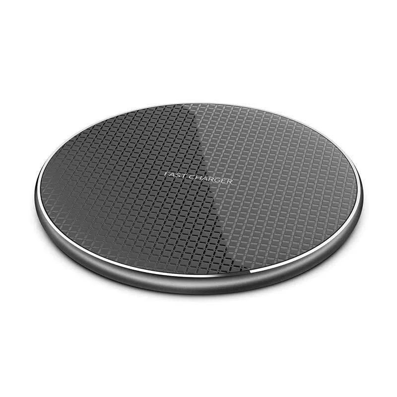 Flat circular charging pad with aluminium finish and glowing LED ring