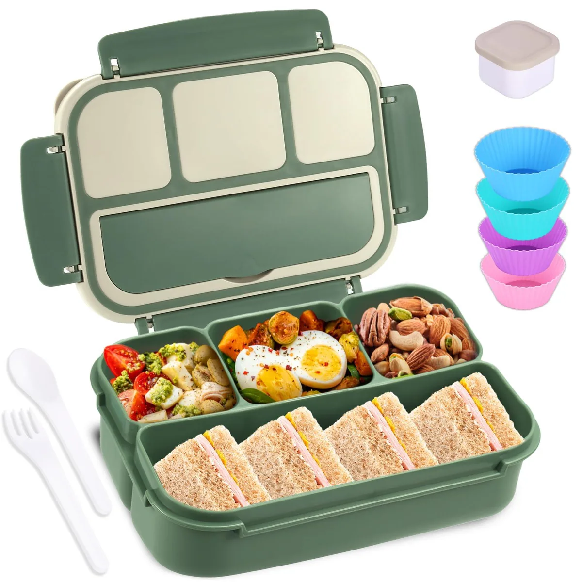 Green rectangular bento box with four compartments, spoon, fork, sauce jar and four silicone muffin liners