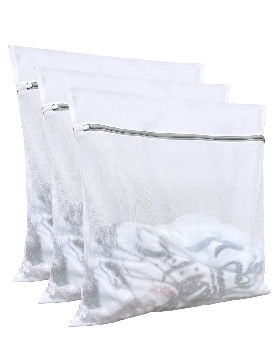 Three beige mesh laundry bags with zipper closures, 24 inch square format