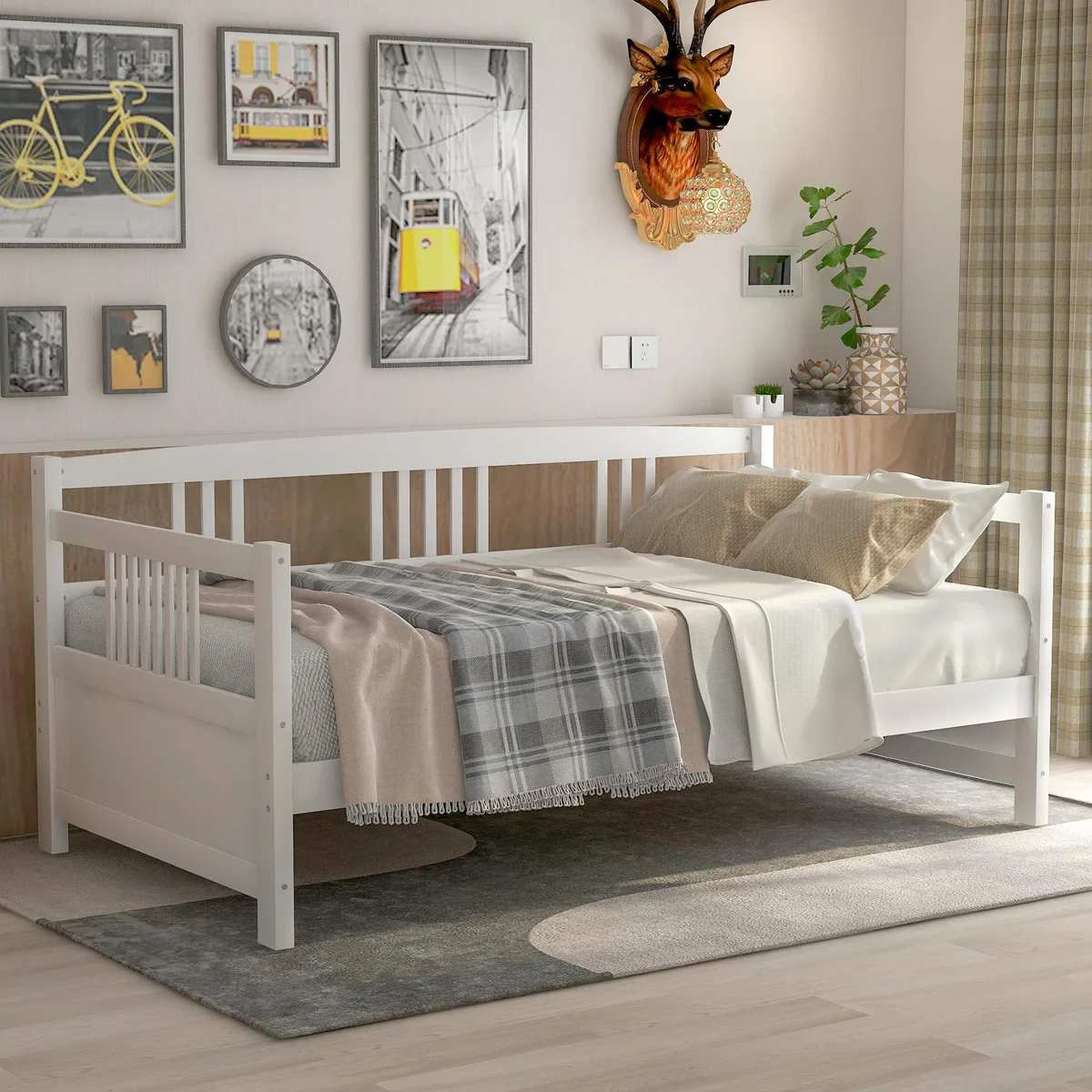 White solid wood twin daybed with three side rails and slatted base