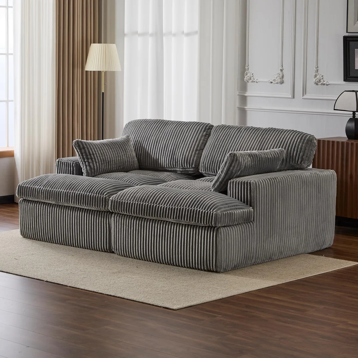 Grey corduroy double-chaise sectional sofa with deep cushions
