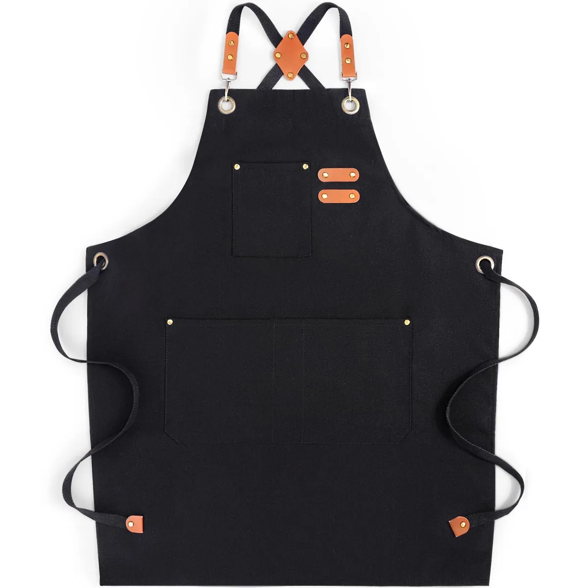 Black canvas chef apron with cross-back straps, brass buckles and four front pockets