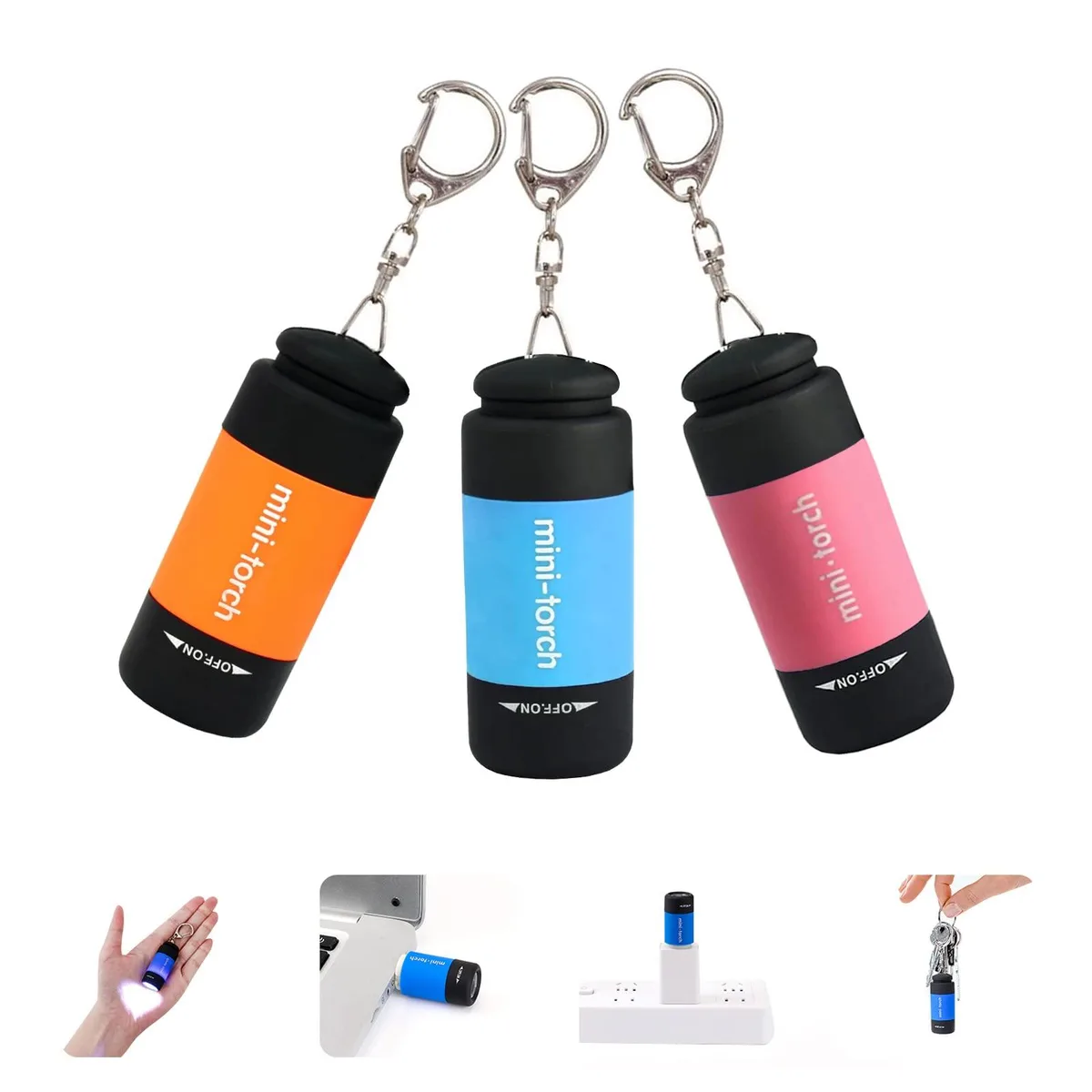 Three small black keychain flashlights with USB ends visible