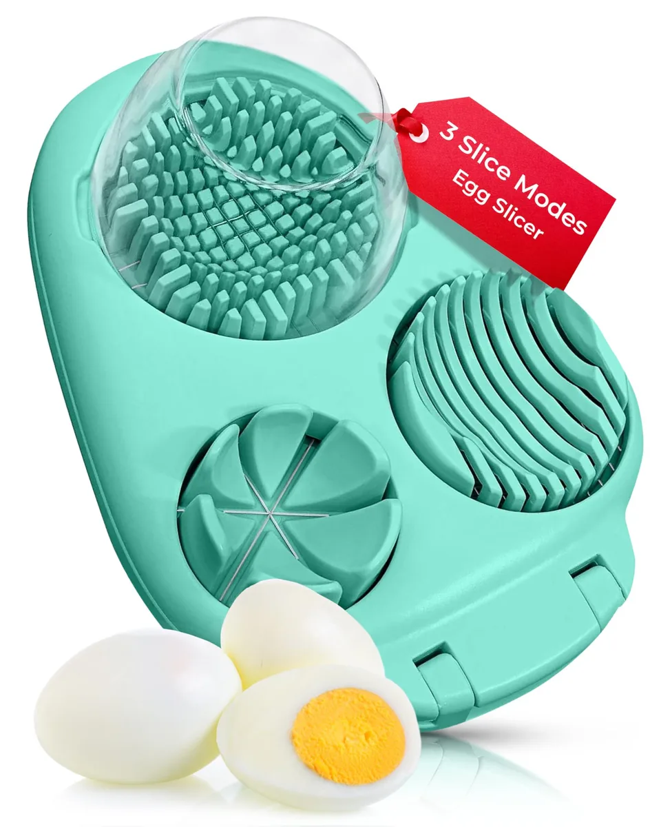 Mint-green plastic egg slicer with stainless steel wires, rectangular base and hinged lid