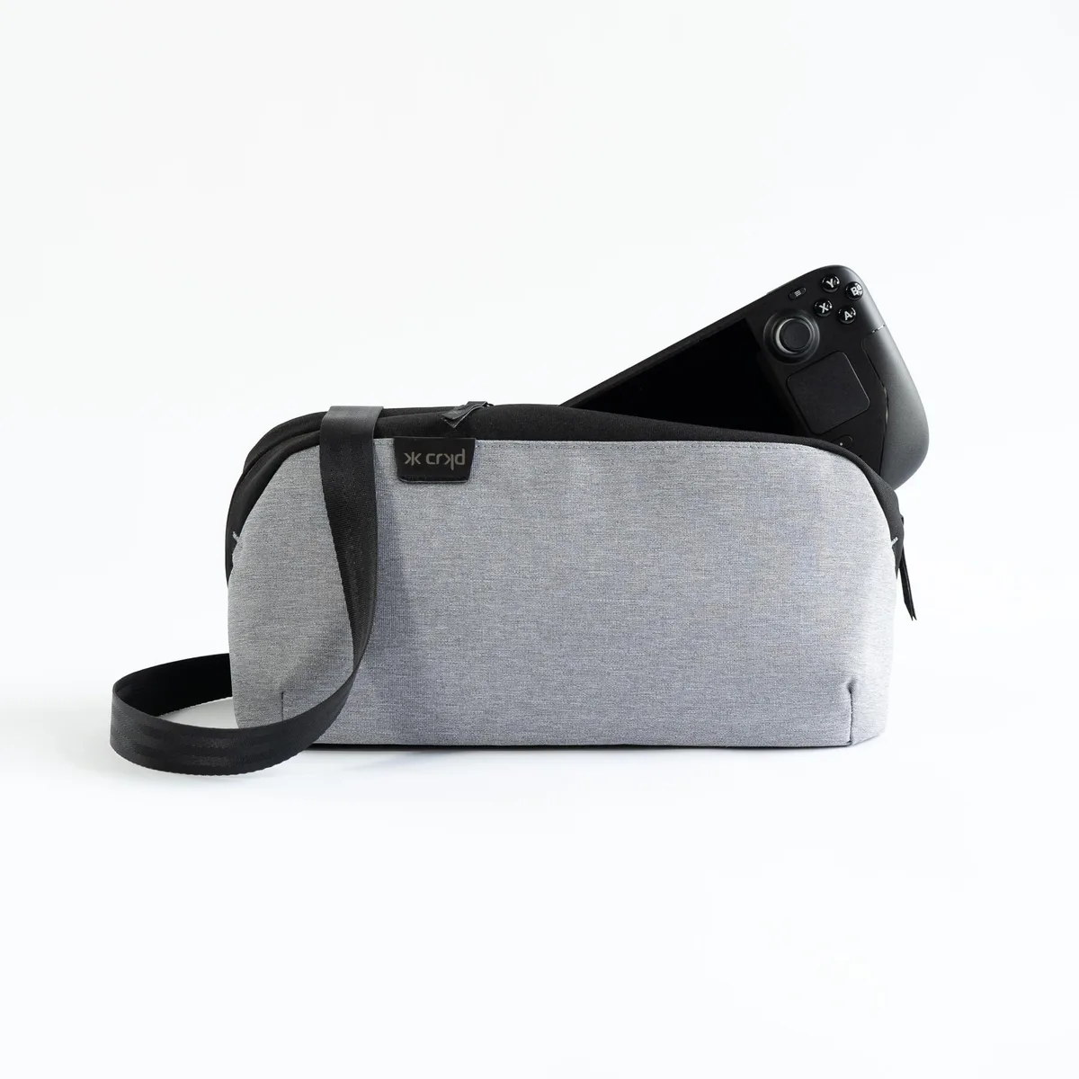 Ash grey soft-shell carry case with adjustable strap and padded exterior pockets