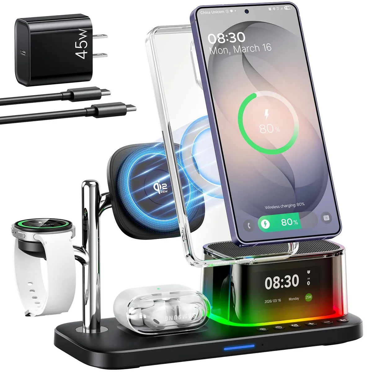 A compact white charging stand with magnetic phone pad, watch cradle, earbuds tray, speaker grille and clock display