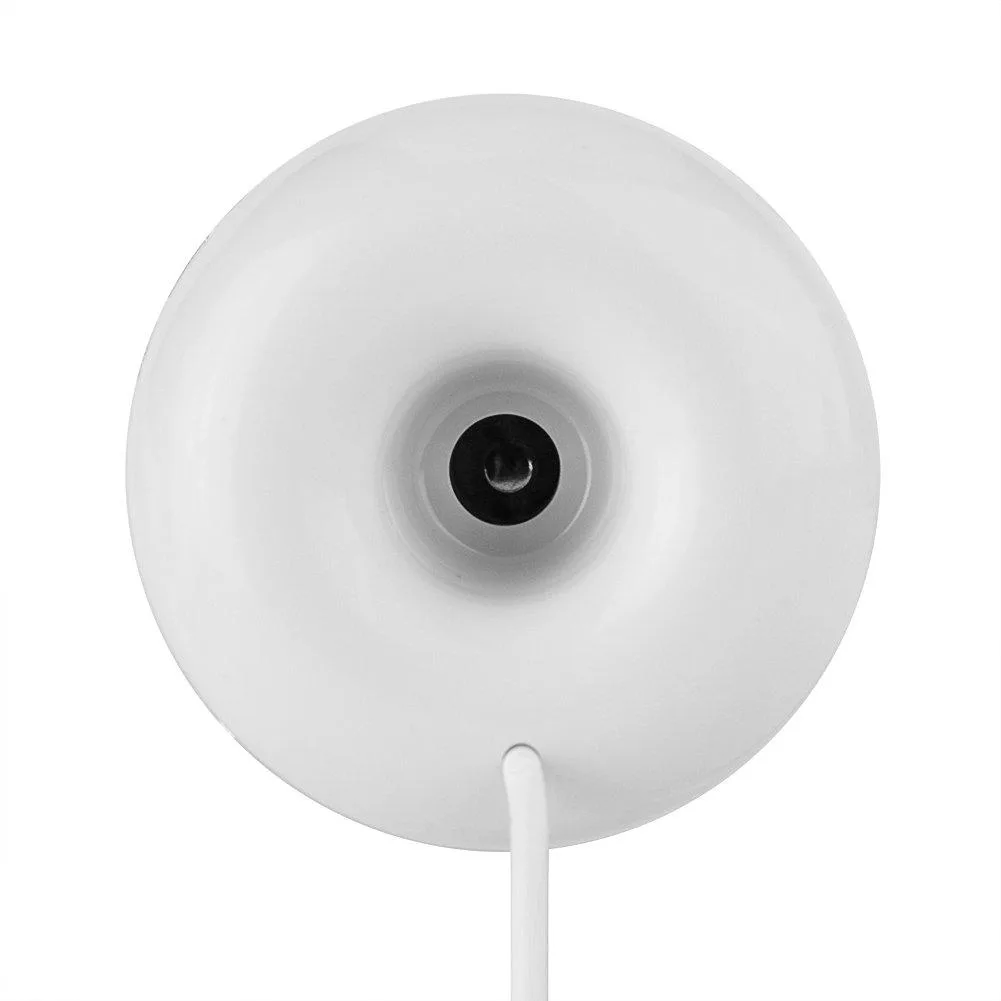 White ring-shaped USB humidifier, 51 mm diameter, floating on water