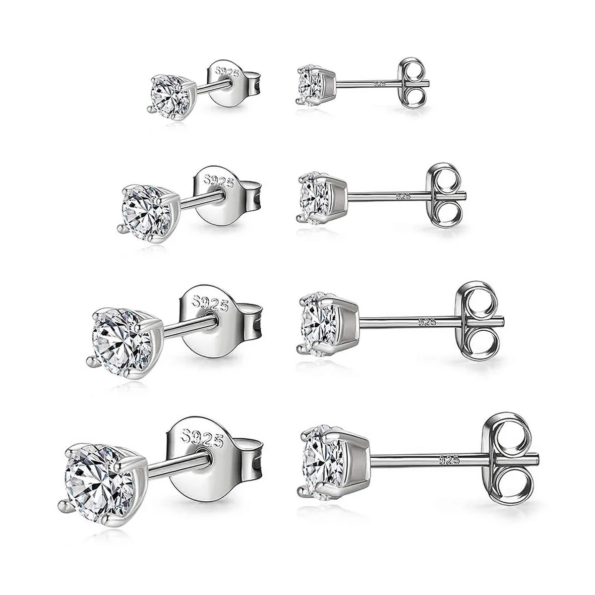 A set of small, round silver stud earrings in four sizes, white gold plated with clear cubic zirconia stones, polished finish